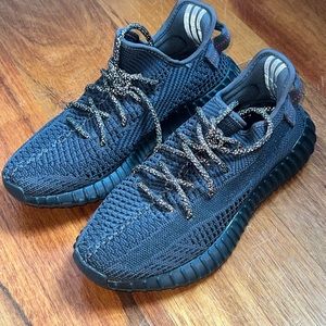 Reflective black Yeezys